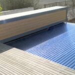 Banc avec piscine débordement et lames polycarbonates
